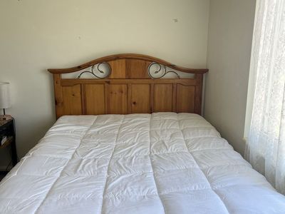 MUST GO TODAY! Stunning antique solid oak queen bed frame, box spring, mattress and mattress topper in excellent condition.
