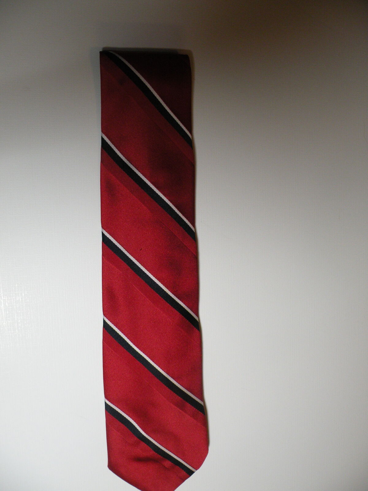 Wembley Red White and Blue 95% Polyester and 5% Silk. Made In USA