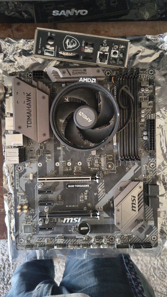 MSI B450 Tomahawk ARSENAL GAMING AMD Motherboard ONLY, no CPU
with CPU Cooler & I/O Shield