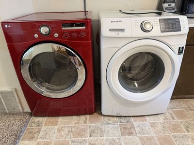 LG Sensor Dry Red Electric Dryer & Samsung VRT White Front Load Washer Set