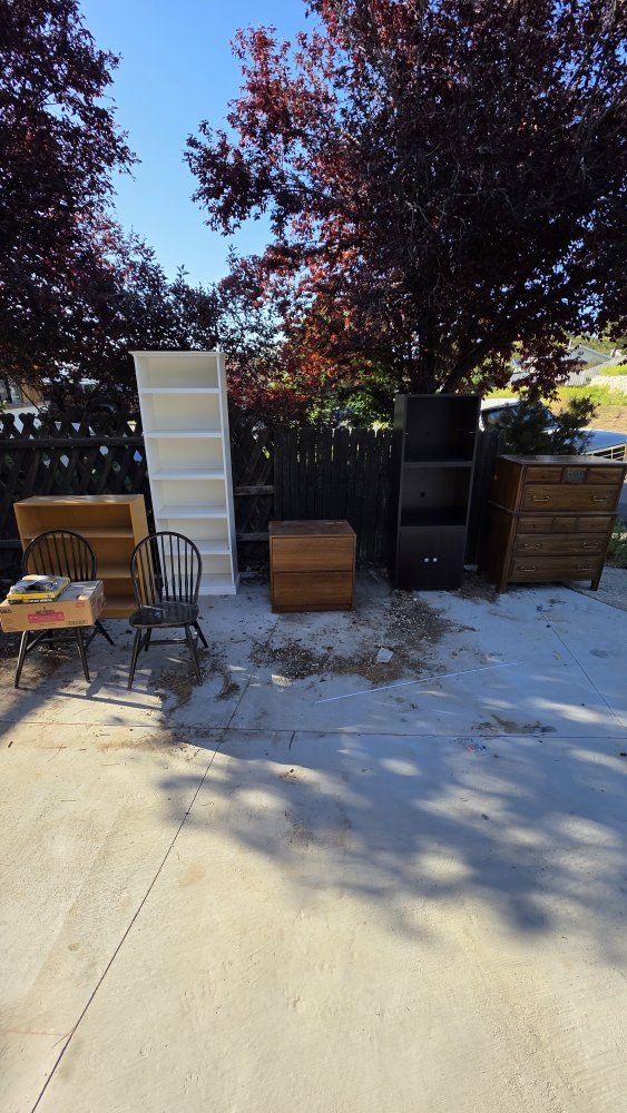 free shelves dressers and chairs . come pick them up or they go in the dumpster