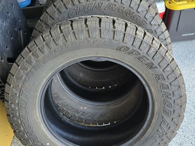 Three LT275/65R-20/10 Open Range AT Plus Tires