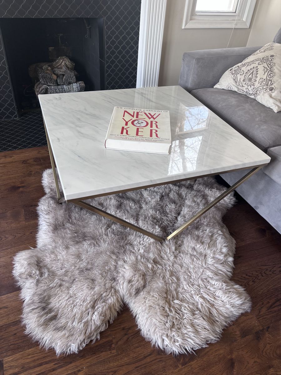 Marble-design coffee table $100