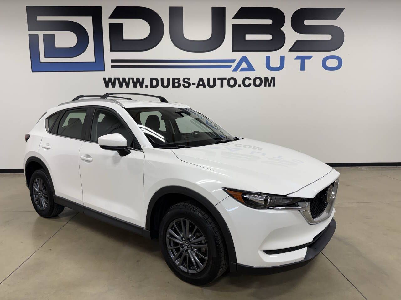 2020 Mazda CX-5 Sport — rebuilt & branded title, 1% below market