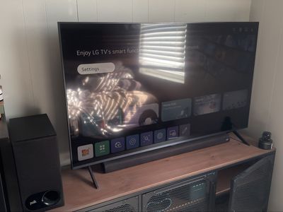 LG Smart TV 4K UHD with Polk Audio Soundbar & Subwoofer Home Theater System
