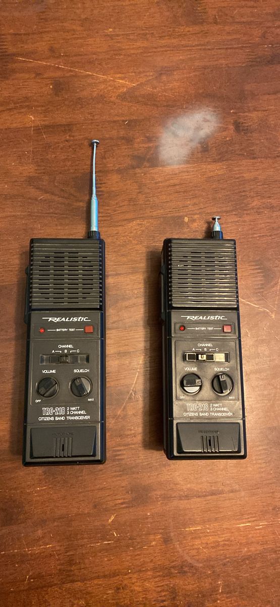 Realistic walkie talkie radio pair