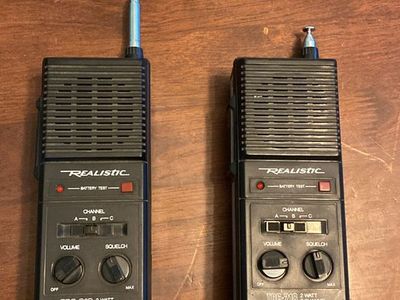 Realistic walkie talkie radio pair