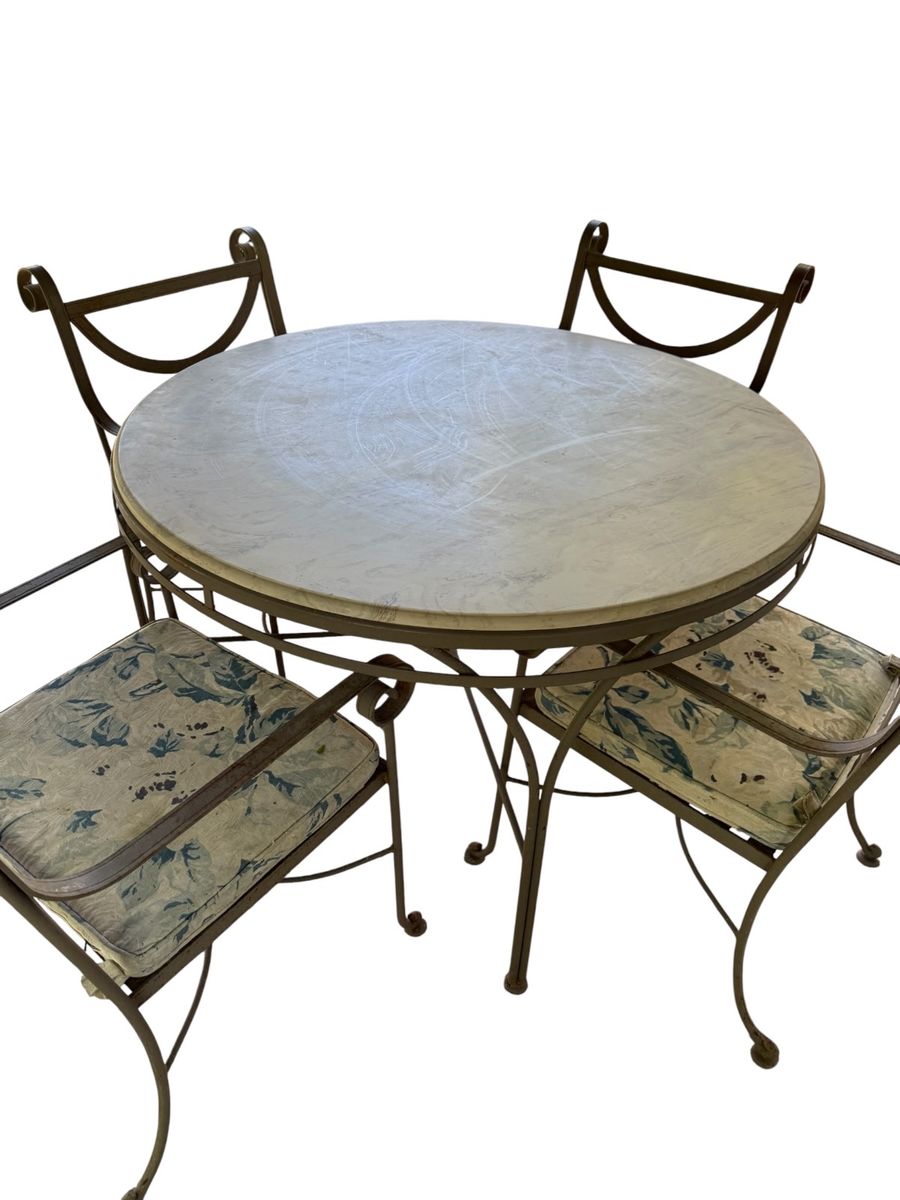 Vintage Wrought Iron Patio Set - Round Table with (i believe) Travertine top & 4 Chairs with Cushions