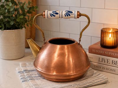 Vintage Copper Tea Kettle with Blue and White Ceramic Handle