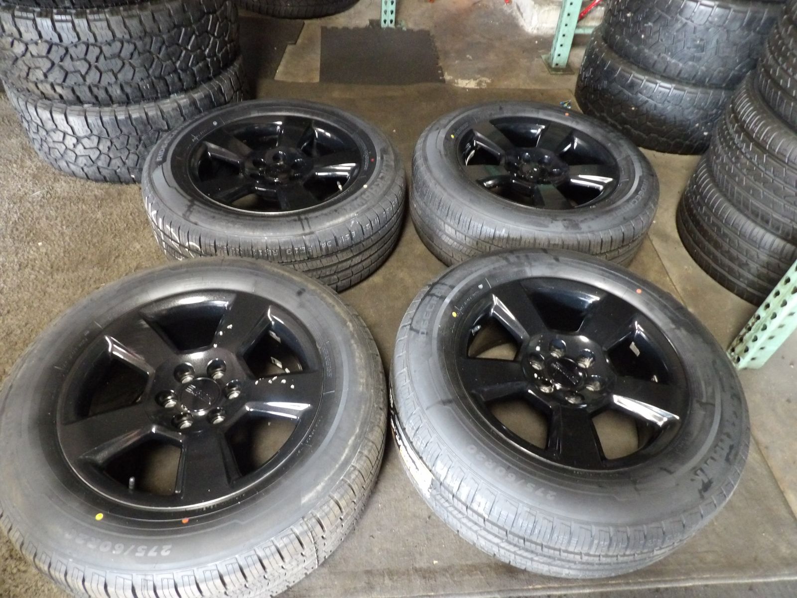 SET OF USED GMC WHEELS 20 INCH 6X139= 6X5.5 AND NEW TIRES 275/60R20 BLACKHAWK