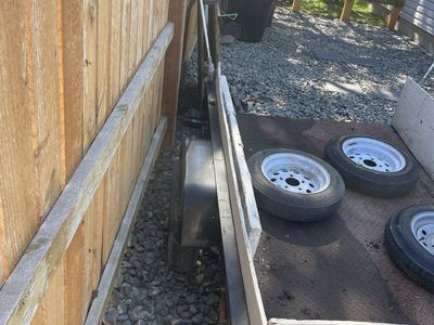 4x6 Utility Trailer with Metal Floor, Dump Tongue, Winch, and Spare Tires