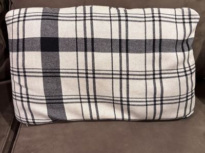 Cute black/white throw pillow.