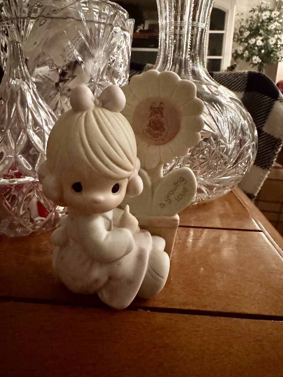 “ a growing love” precious moments figurine