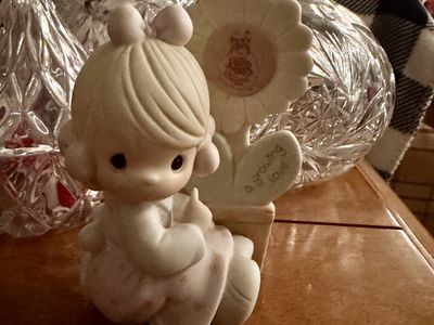 “ a growing love” precious moments figurine