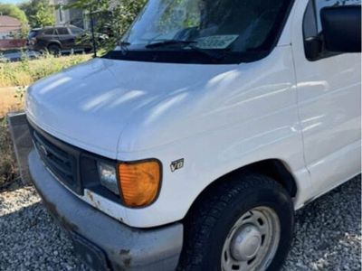 Ford E-150 van car truck work vehicle