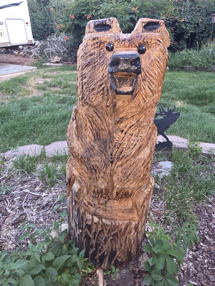 Chainsaw-carved Bear (Smiley)