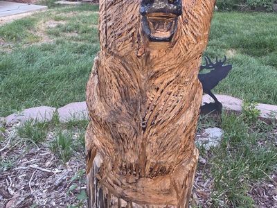 Chainsaw-carved Bear (Smiley)