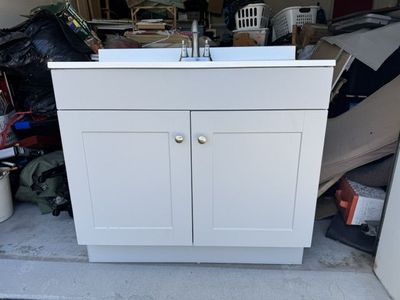 Bathroom vanity like new includes counter and faucet