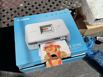 Canon Selphy CP740 Compact Photo Printer Bundle with Ink and Paper