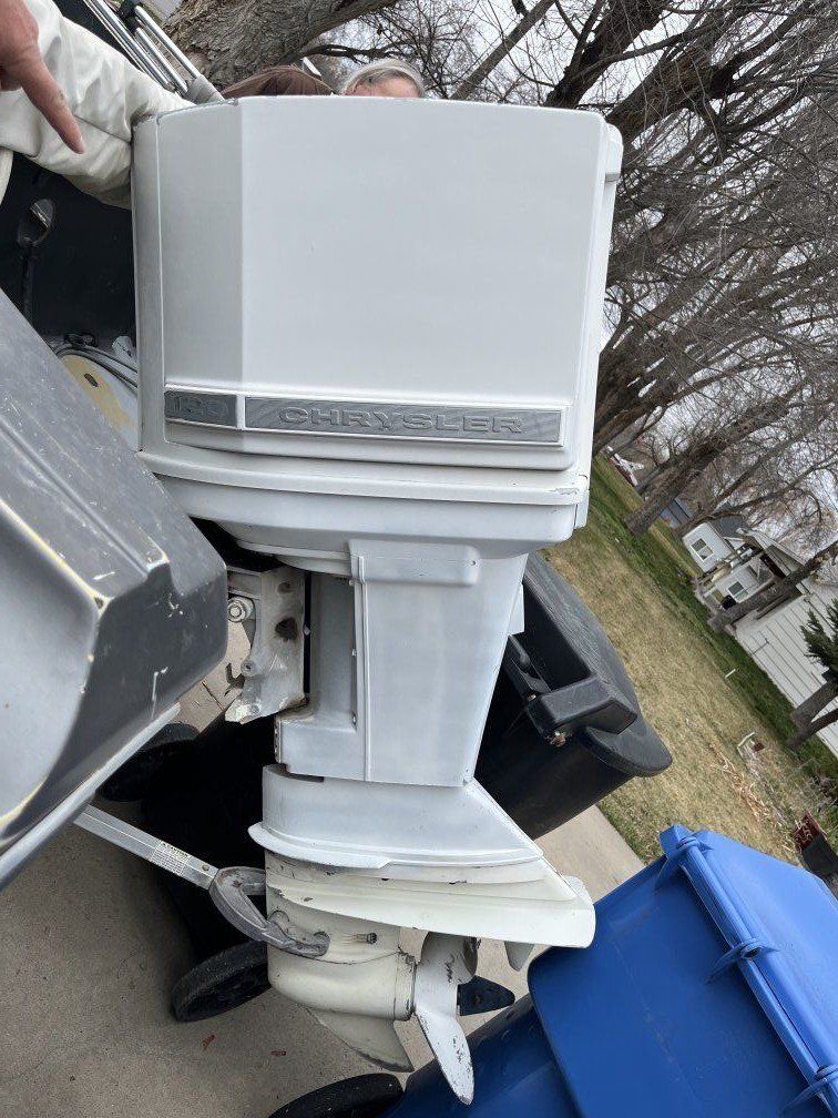 Chrysler 120 w/boat & trailer