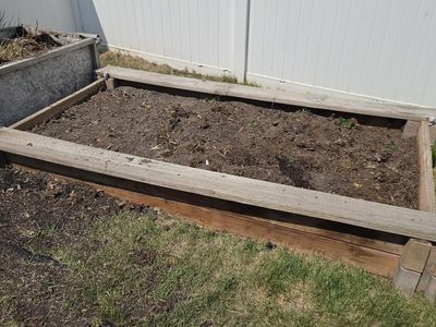 Free one 4' x 8' Wood planter with good top soil from fruit cultivation