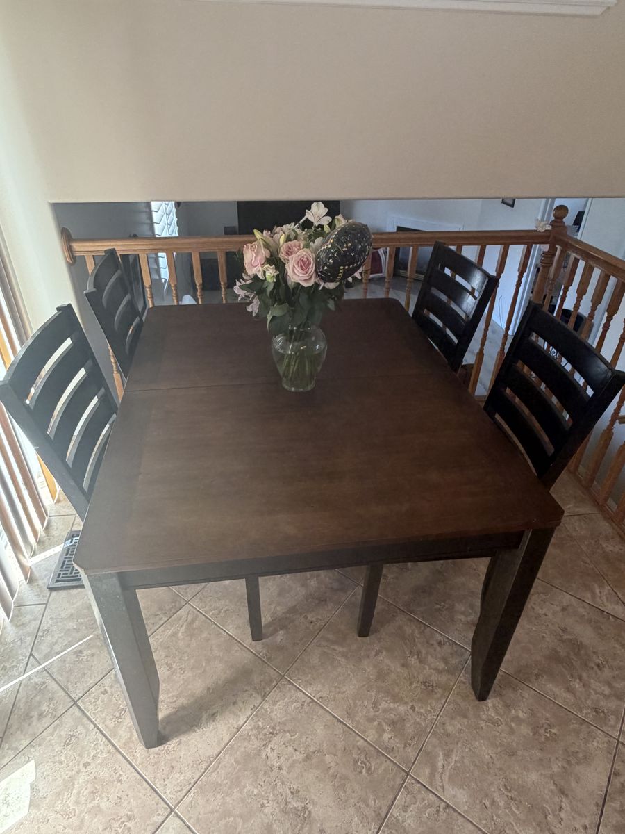 Dark wood dining table set