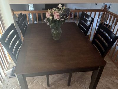 Dark wood dining table set
