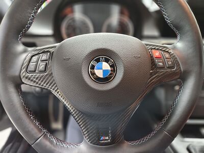 Carbon Fiber BMW steering wheel cover and trim (E-chassis cars)