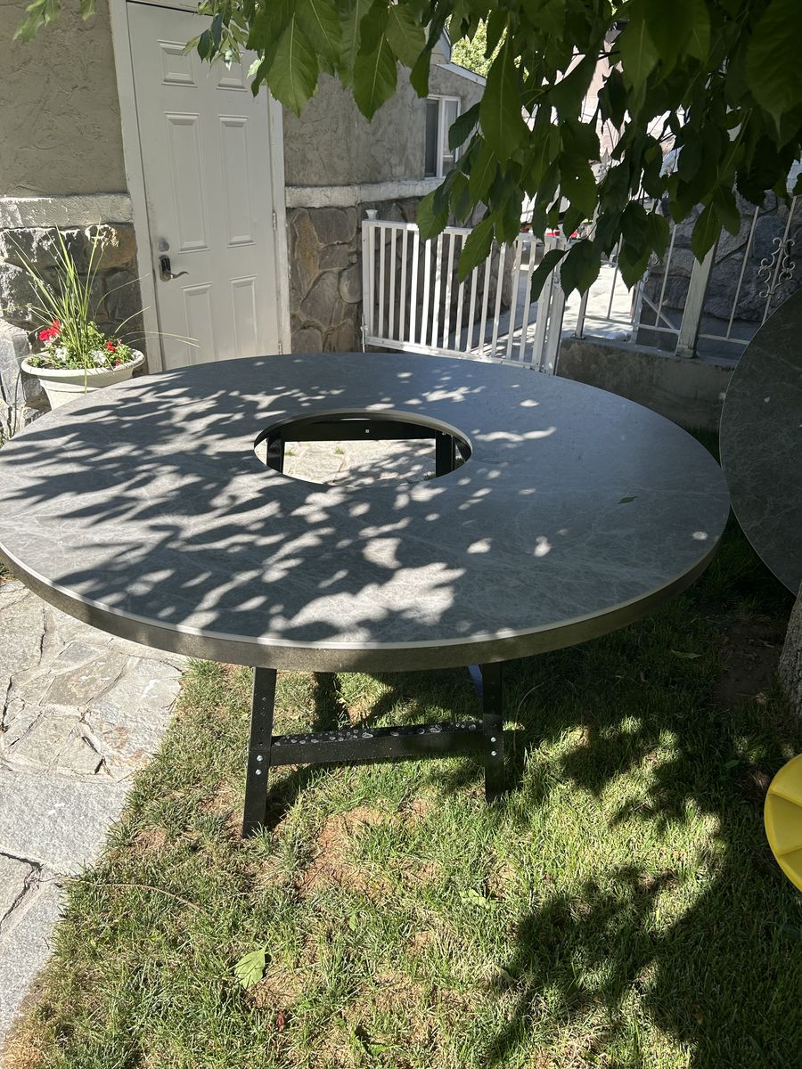 Outdoor heavy stone picnic tables. Slate or marble.