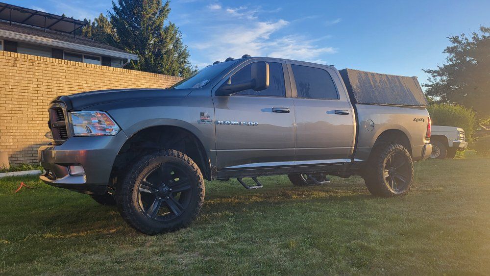2012 RAM 1500 Quad Cab Pickup Truck - Lifted, Custom Wheels, Light Bar