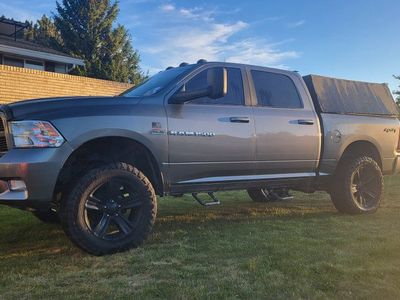2012 RAM 1500 Quad Cab Pickup Truck - Lifted, Custom Wheels, Light Bar