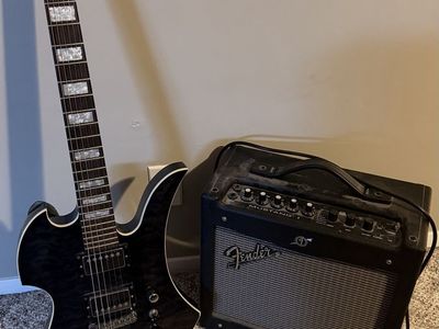 B.C. Rich Masterpiece Electric Guitar and Fender mustang amp
