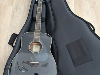 Black Yamaha Acoustic Guitar