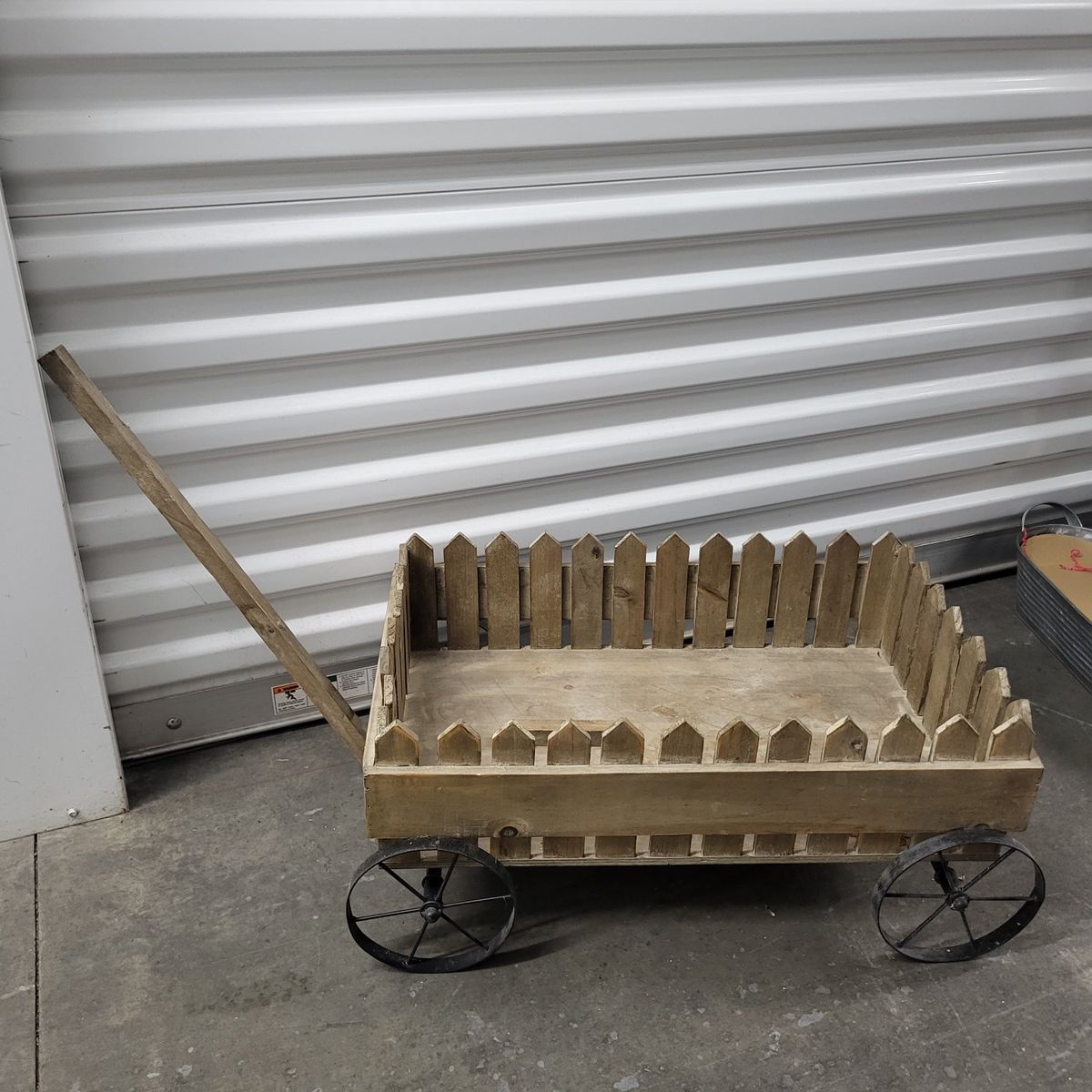 Rustic Decorative Wooden Wagon with Picket Fence Sides and Metal Wheels