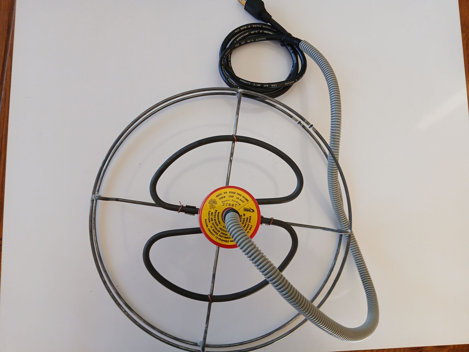 SINKING TANK DE-ICER