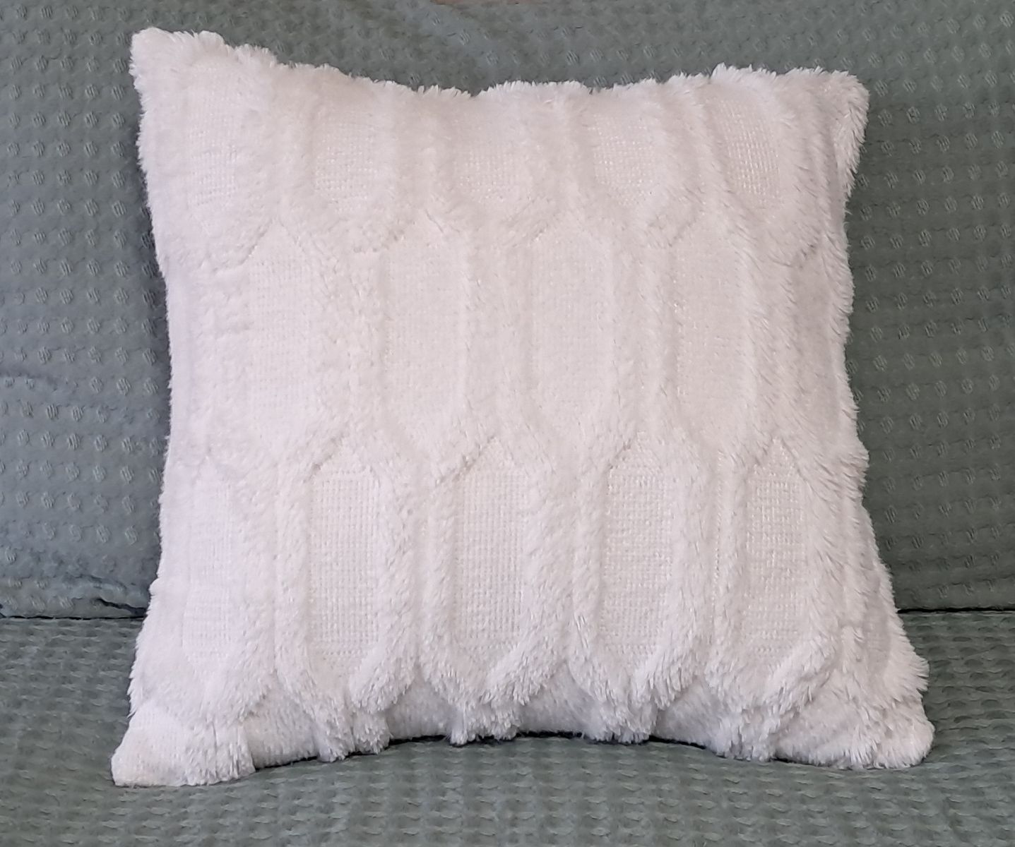Plush white throw pillows