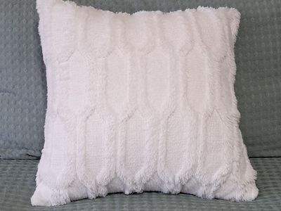 Plush white throw pillows