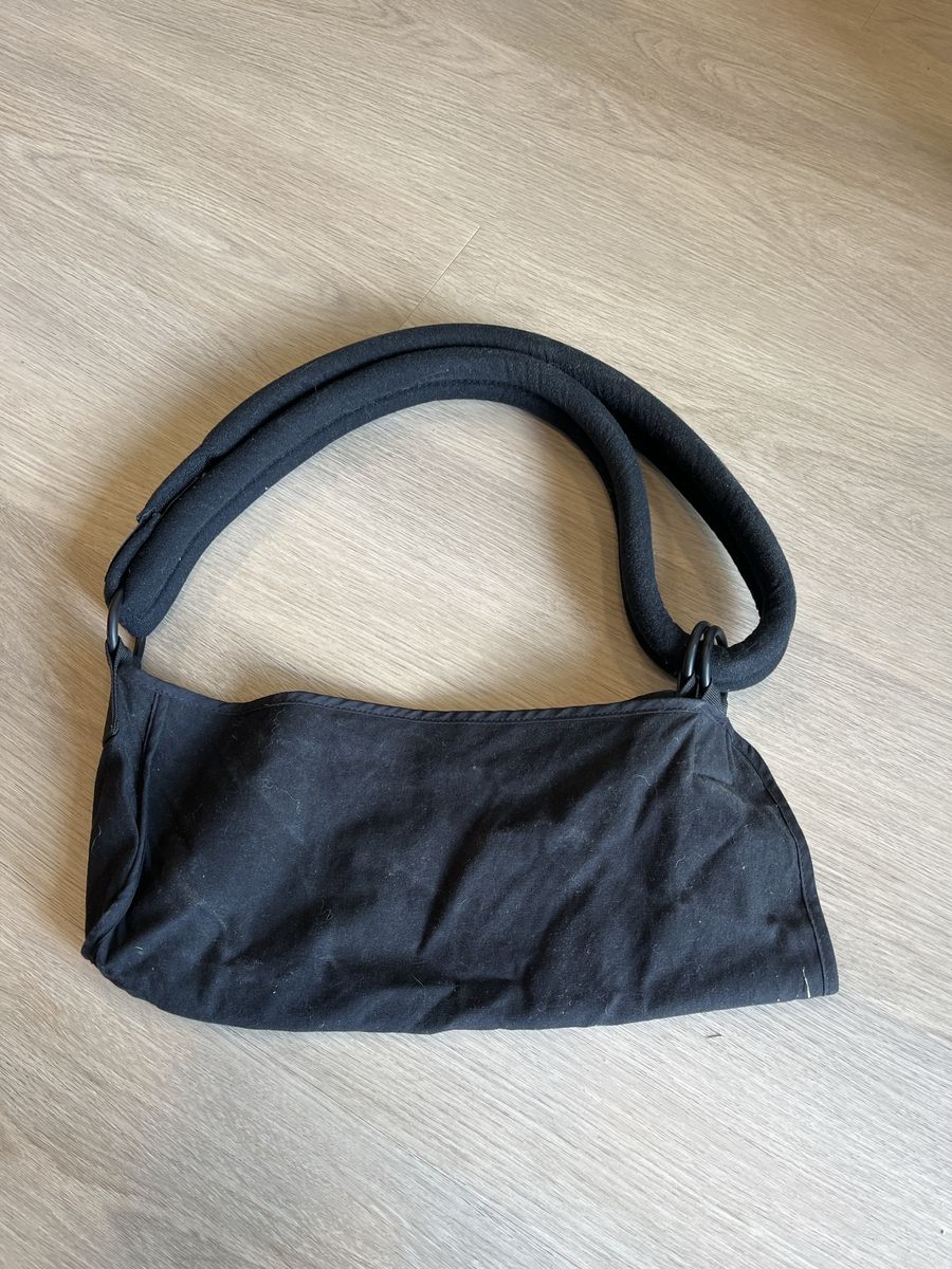 Black Fabric Arm Sling with Thick Padded Shoulder Strap Used