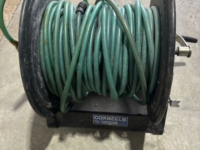 Pneumatic hose and reel