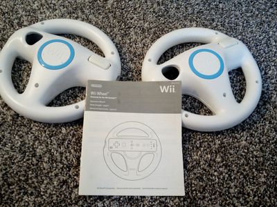 Nintendo Wii OEM Mario Kart Controllers, and instruction manual, Cleaned