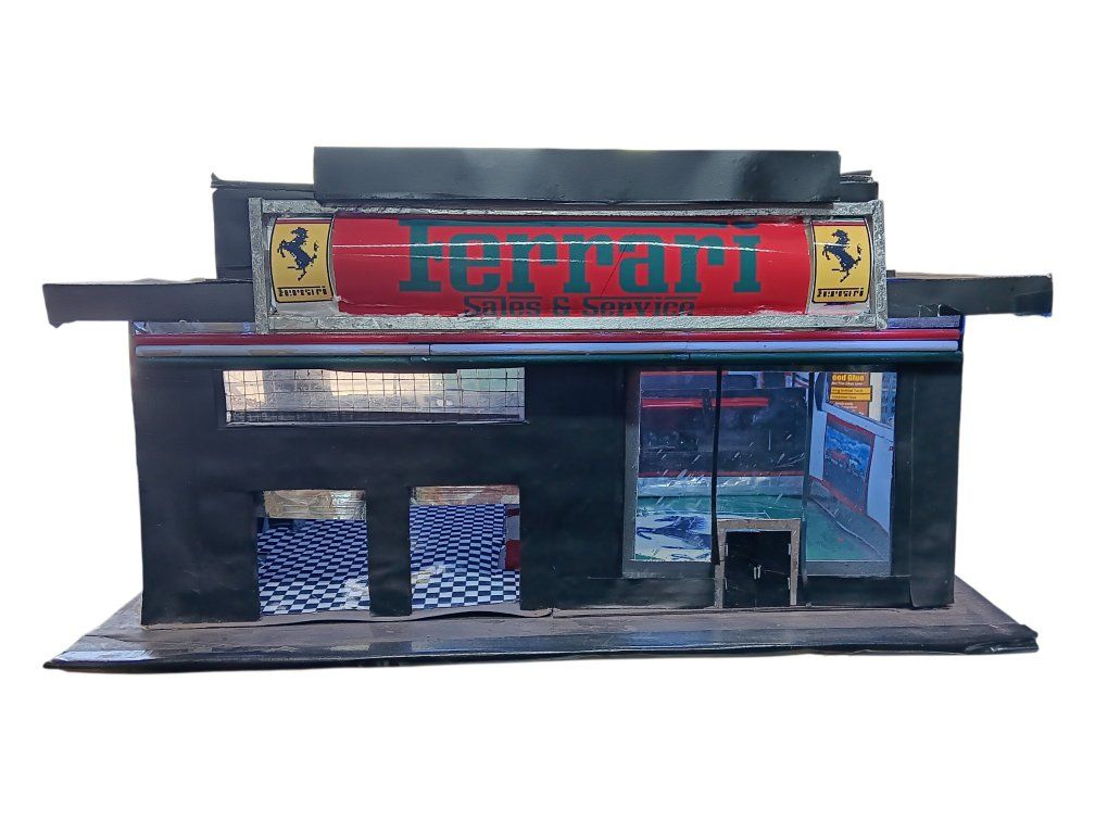 1/43 scale Ferrari Dealership..scratcbuilt.
lighted.