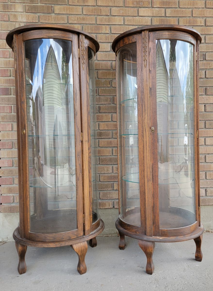 All oak and glass curio cabinets