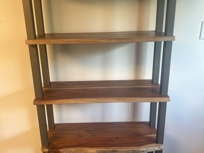 Natural wood shelves with steel support. $100