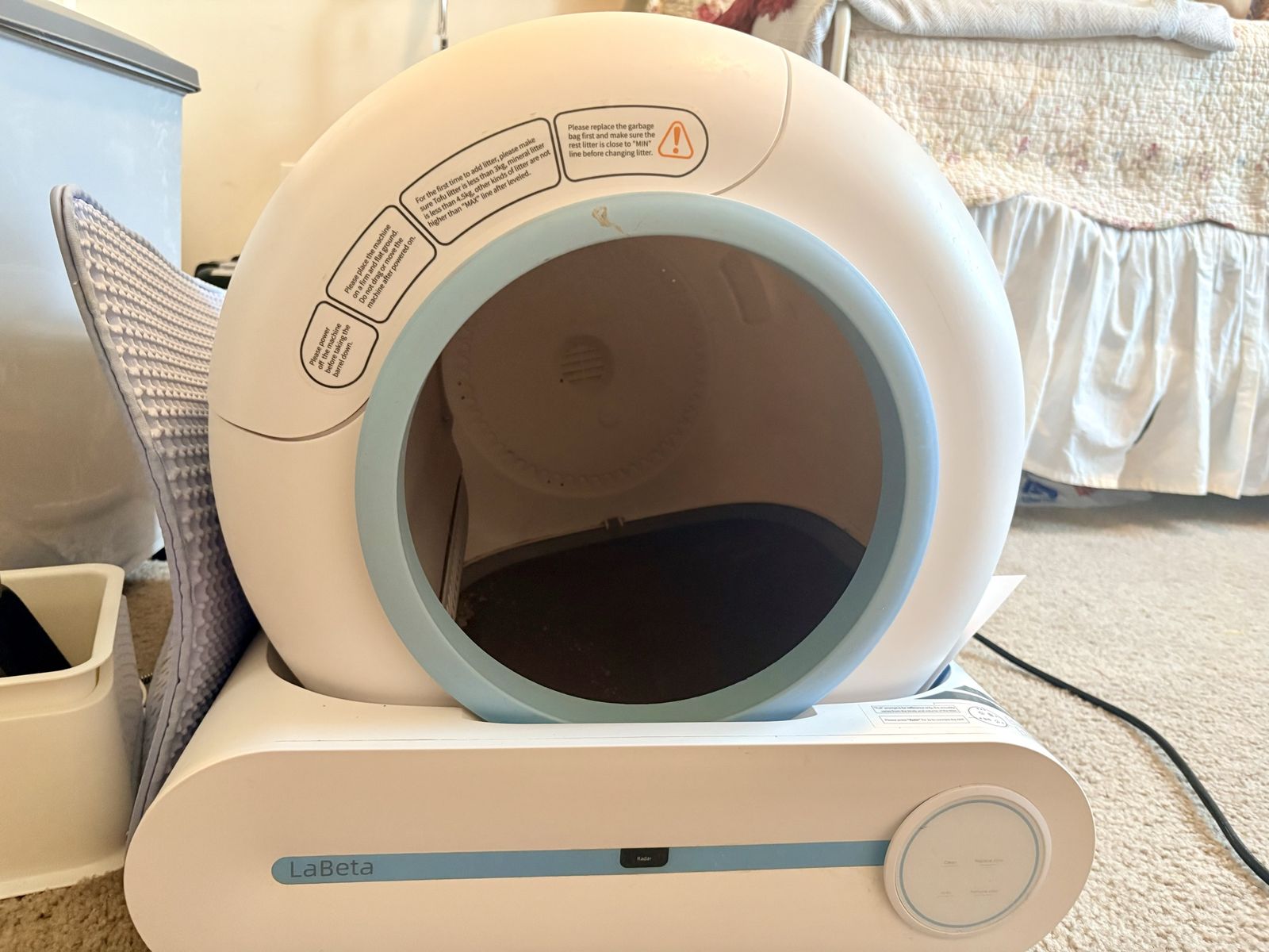  LaBeta self-cleaning automatic cat litter box featuring a spherical design and app control.