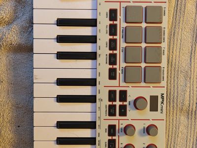 AKAI Professional MPK Mini Play MK3 25-Key USB MIDI Keyboard Controller