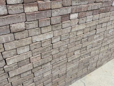 Stack of Used Red and Gray Concrete Pavers / Landscape Bricks