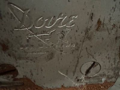 “vintage wooden skis with bear-trap bindings – cabin decor”