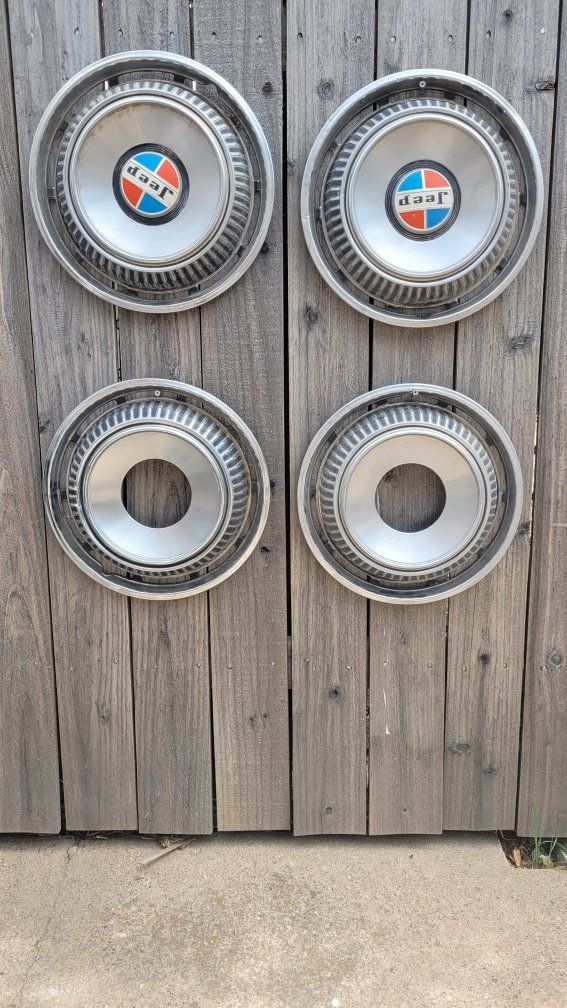 70's era Jeep 4×4 hubcaps.