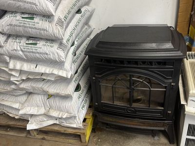 Pellet stove with 25 bags of pellets