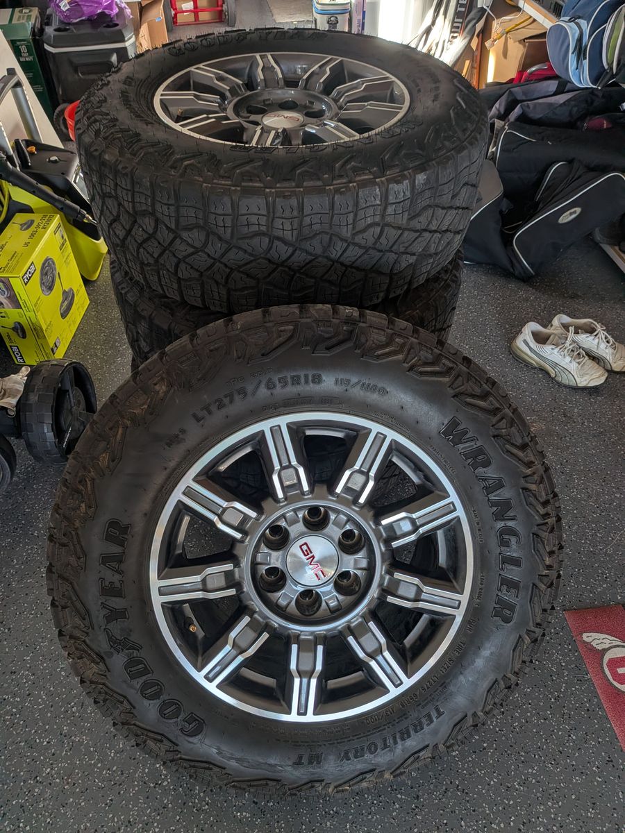 Goodyear Wrangler Territory MT LT275/65R18 All-Terrain Tires & GMC Wheels (Set of 4)